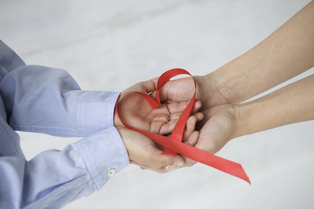 Red ribbon in the shape of heart